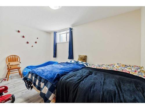 4 Madison Court, Strathmore, AB - Indoor Photo Showing Bedroom