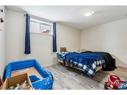 4 Madison Court, Strathmore, AB - Indoor Photo Showing Bedroom