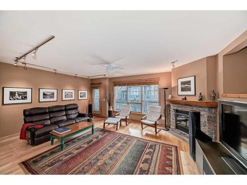 148-200 Prospect Heights, Canmore, AB - Indoor Photo Showing Living Room With Fireplace