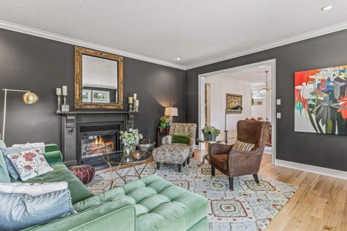 930 9 Street, Canmore, AB - Indoor Photo Showing Living Room With Fireplace