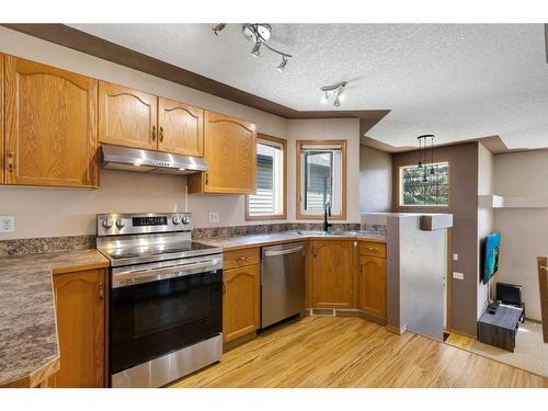 34 Covehaven Rise Ne, Calgary, AB - Indoor Photo Showing Kitchen With Double Sink