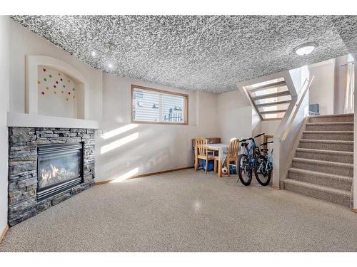 34 Covehaven Rise Ne, Calgary, AB - Indoor With Fireplace