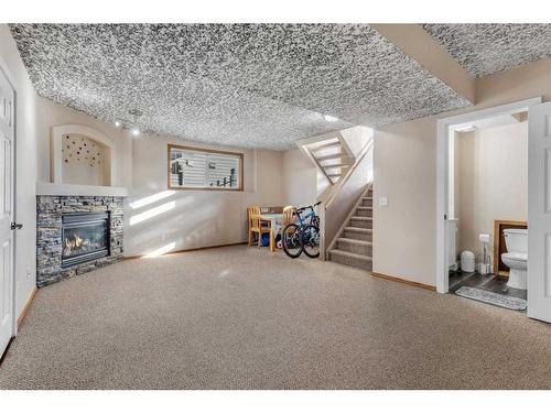 34 Covehaven Rise Ne, Calgary, AB - Indoor With Fireplace