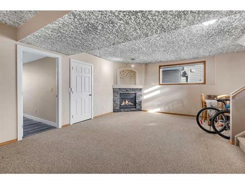 34 Covehaven Rise Ne, Calgary, AB - Indoor With Fireplace