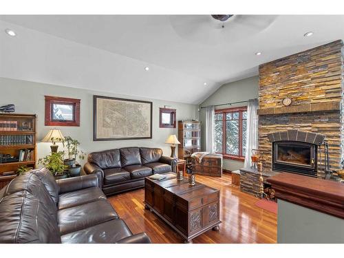 2917 Lathom Crescent Sw, Calgary, AB - Indoor Photo Showing Living Room With Fireplace