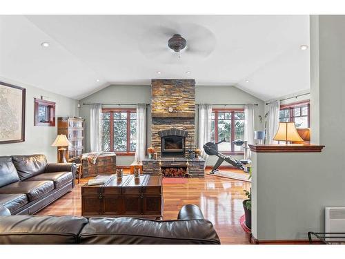 2917 Lathom Crescent Sw, Calgary, AB - Indoor Photo Showing Living Room With Fireplace