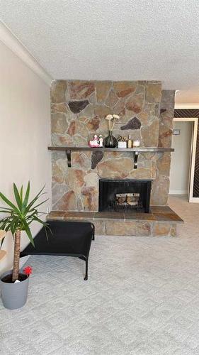 5015 Centre A Street Ne, Calgary, AB - Indoor With Fireplace