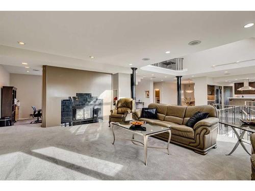 42 Woodhaven Crescent Sw, Calgary, AB - Indoor Photo Showing Living Room With Fireplace