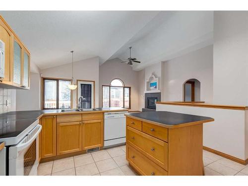 162 Rocky Ridge Circle Nw, Calgary, AB - Indoor Photo Showing Kitchen With Double Sink