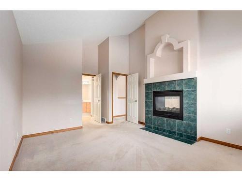 162 Rocky Ridge Circle Nw, Calgary, AB - Indoor With Fireplace