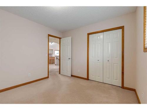 162 Rocky Ridge Circle Nw, Calgary, AB - Indoor Photo Showing Other Room