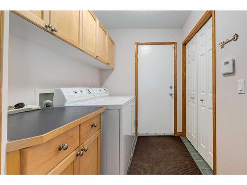 162 Rocky Ridge Circle Nw, Calgary, AB - Indoor Photo Showing Laundry Room