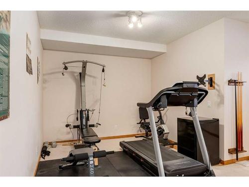 162 Rocky Ridge Circle Nw, Calgary, AB - Indoor Photo Showing Gym Room