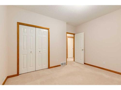 162 Rocky Ridge Circle Nw, Calgary, AB - Indoor Photo Showing Other Room