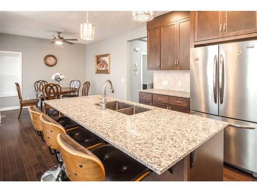 11 Evansview Road Nw, Calgary, AB - Indoor Photo Showing Kitchen With Stainless Steel Kitchen With Double Sink