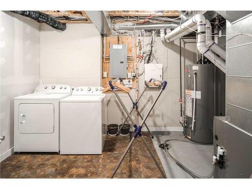 11 Evansview Road Nw, Calgary, AB - Indoor Photo Showing Laundry Room