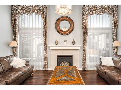 11 Evansview Road Nw, Calgary, AB - Indoor Photo Showing Living Room With Fireplace