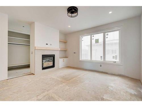 8127 Bowglen Road Nw, Calgary, AB - Indoor With Fireplace