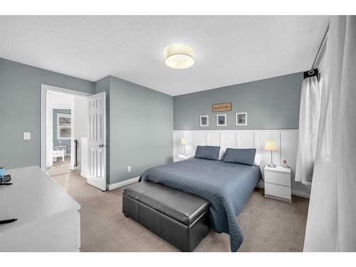 22 Dover Mews Se, Calgary, AB - Indoor Photo Showing Bedroom