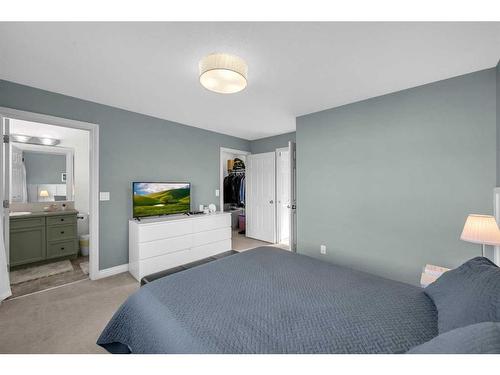 22 Dover Mews Se, Calgary, AB - Indoor Photo Showing Bedroom