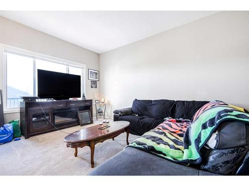 146 Bridlerange Place Sw, Calgary, AB - Indoor Photo Showing Living Room