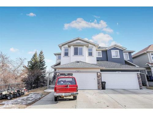 146 Bridlerange Place Sw, Calgary, AB - Outdoor With Facade