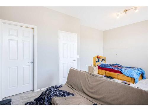 146 Bridlerange Place Sw, Calgary, AB - Indoor Photo Showing Bedroom