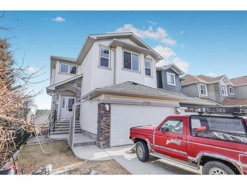 146 Bridlerange Place Sw, Calgary, AB - Outdoor With Facade