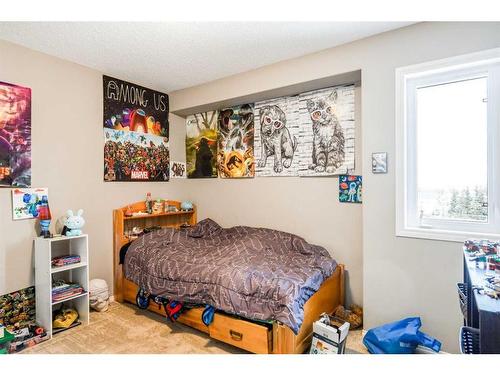 146 Bridlerange Place Sw, Calgary, AB - Indoor Photo Showing Bedroom