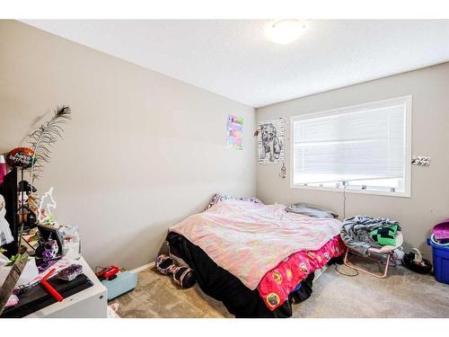 146 Bridlerange Place Sw, Calgary, AB - Indoor Photo Showing Bedroom