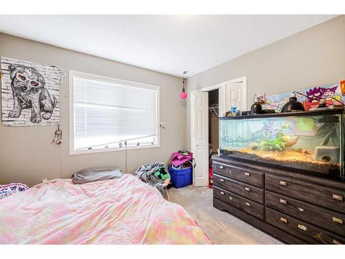 146 Bridlerange Place Sw, Calgary, AB - Indoor Photo Showing Bedroom