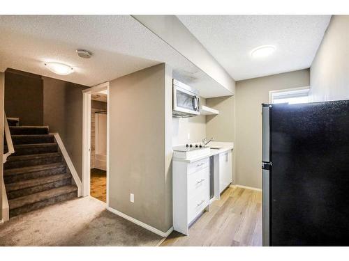 146 Bridlerange Place Sw, Calgary, AB - Indoor Photo Showing Other Room