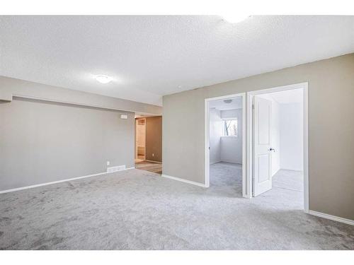 146 Bridlerange Place Sw, Calgary, AB - Indoor Photo Showing Other Room