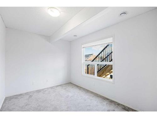 146 Bridlerange Place Sw, Calgary, AB - Indoor Photo Showing Other Room