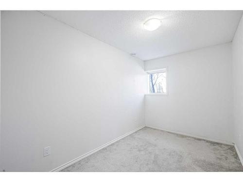 146 Bridlerange Place Sw, Calgary, AB - Indoor Photo Showing Other Room