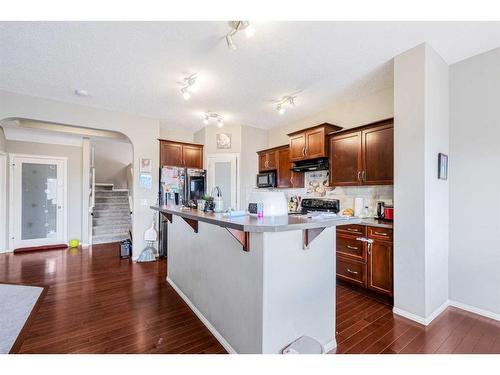 146 Bridlerange Place Sw, Calgary, AB - Indoor Photo Showing Kitchen