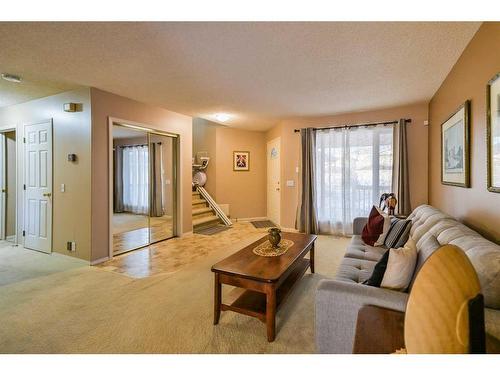 59 Coral Springs Boulevard Ne, Calgary, AB - Indoor Photo Showing Living Room