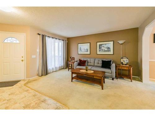 59 Coral Springs Boulevard Ne, Calgary, AB - Indoor Photo Showing Living Room