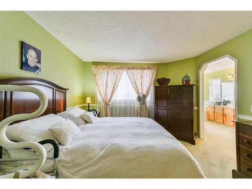 59 Coral Springs Boulevard Ne, Calgary, AB - Indoor Photo Showing Bedroom