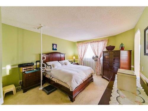 59 Coral Springs Boulevard Ne, Calgary, AB - Indoor Photo Showing Bedroom