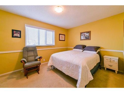 59 Coral Springs Boulevard Ne, Calgary, AB - Indoor Photo Showing Bedroom