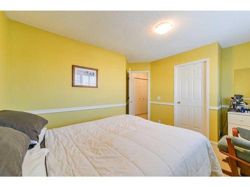 59 Coral Springs Boulevard Ne, Calgary, AB - Indoor Photo Showing Bedroom