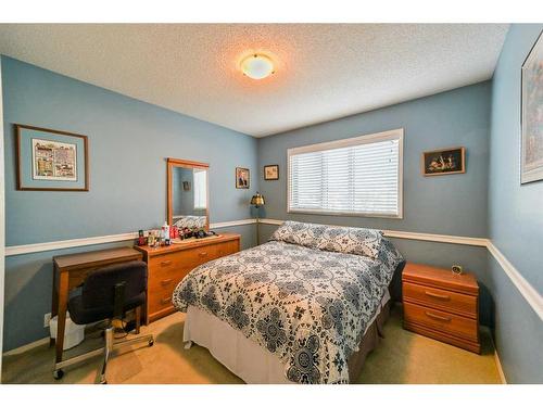 59 Coral Springs Boulevard Ne, Calgary, AB - Indoor Photo Showing Bedroom