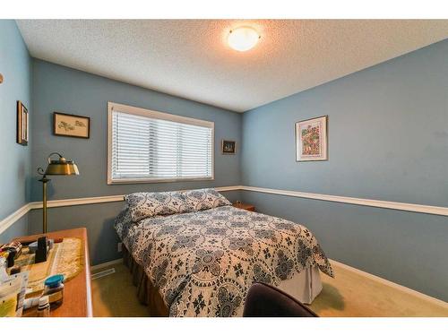 59 Coral Springs Boulevard Ne, Calgary, AB - Indoor Photo Showing Bedroom