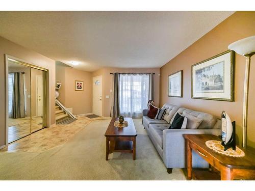 59 Coral Springs Boulevard Ne, Calgary, AB - Indoor Photo Showing Living Room