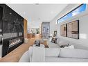 511 30 Street Nw, Calgary, AB  - Indoor Photo Showing Living Room With Fireplace 