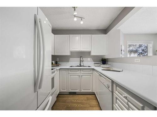 1308 154 Avenue Sw, Calgary, AB - Indoor Photo Showing Kitchen With Double Sink