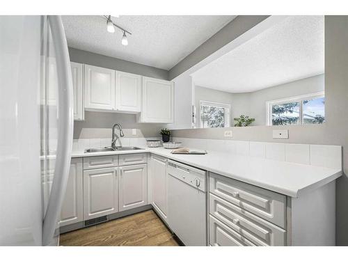 1308 154 Avenue Sw, Calgary, AB - Indoor Photo Showing Kitchen With Double Sink