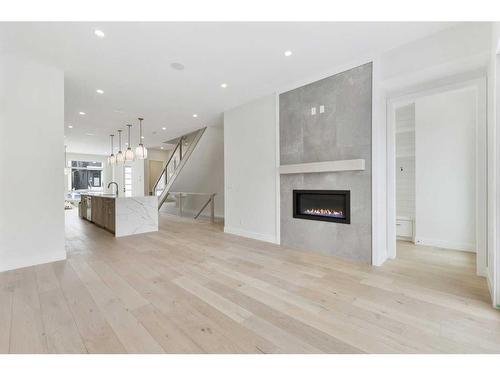 3536 7 Avenue Sw, Calgary, AB - Indoor Photo Showing Living Room With Fireplace