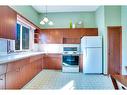 2815 Burgess Drive Nw, Calgary, AB  - Indoor Photo Showing Kitchen 